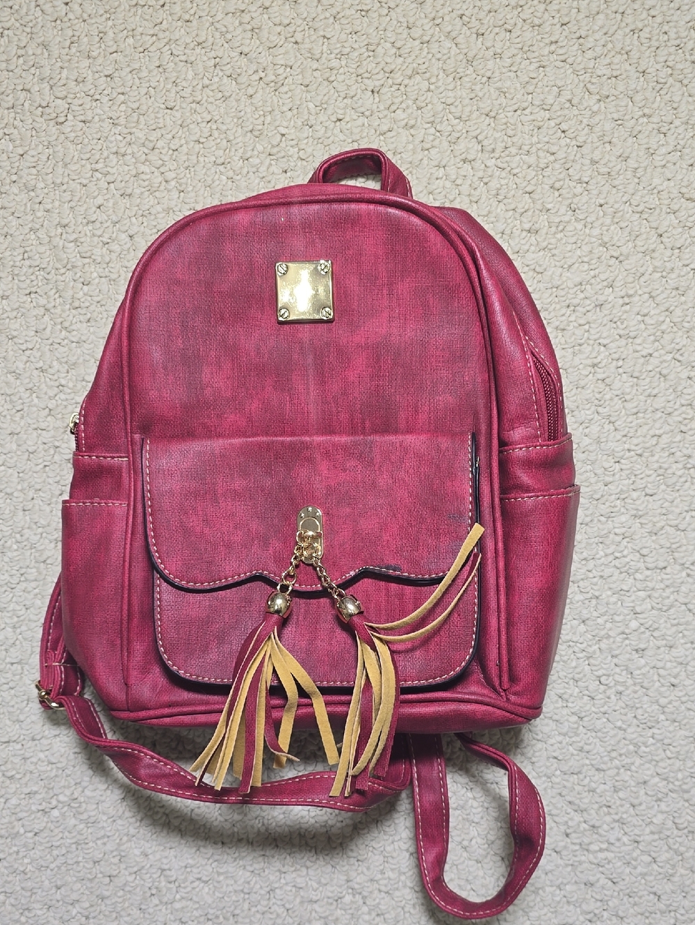 Compact Pink Faux-Leather Tassel Backpack